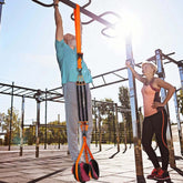 Strengthsphere Heavy Duty Pull Up Bands Set used in outdoor fitness training for strengthening pull-up performance.