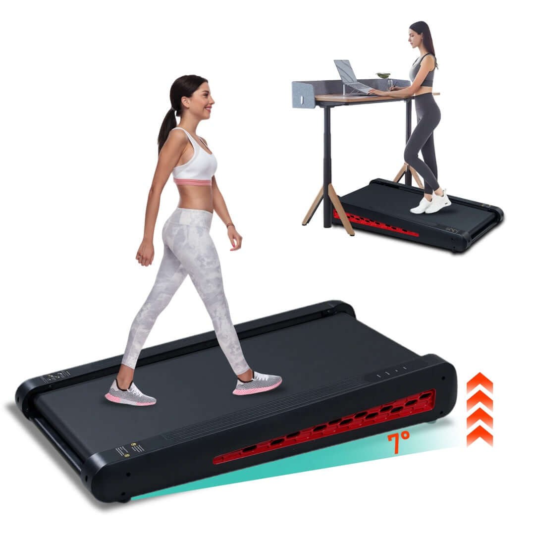 Strengthsphere Incline Walking Pad Treadmill used by a woman walking while working at a desk, featuring a 7-degree incline.